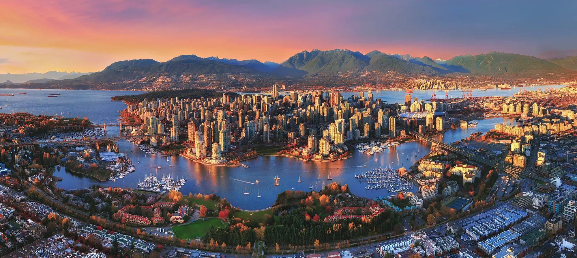 Coal Harbour seawall and Pinnacle Hotel Harbourfront in downtown Vancouver